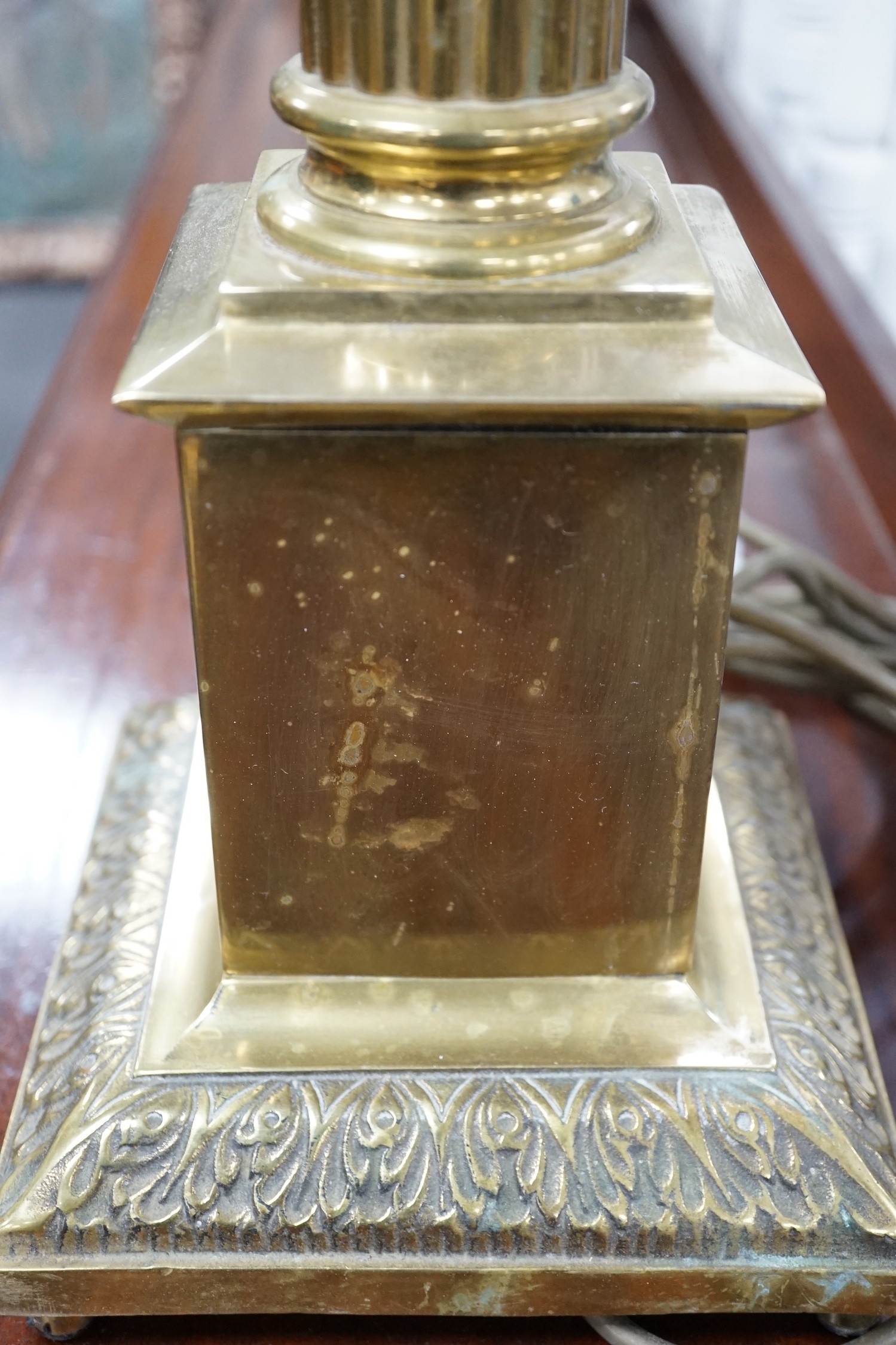 A brass Corinthian column lamp base, 74cm overall